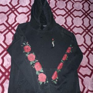 Black with roses on the sleeve